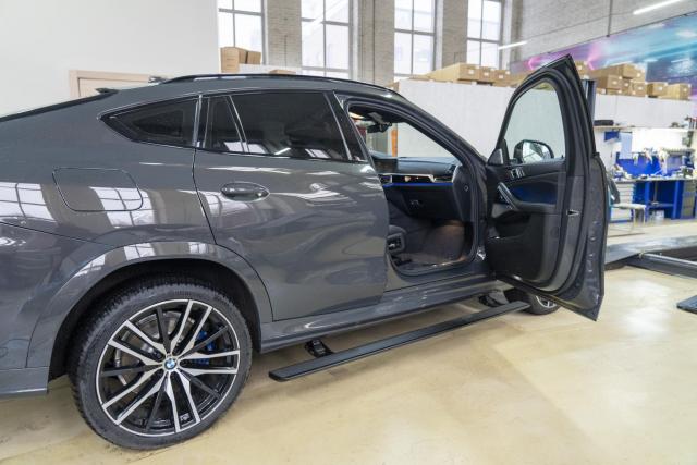 Выдвижные электрические пороги ATS на BMW X6 G06