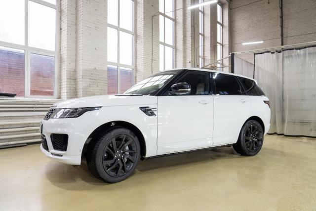 Установка выдвижных электропорогов ATS на Range Rover Sport