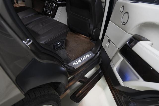 Установка выдвижных электропорогов ATS на Range Rover Vogue Long